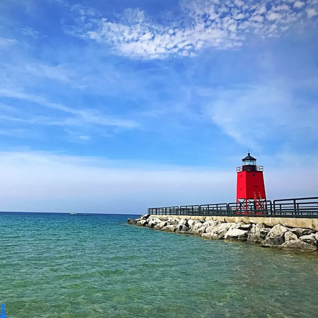 Lake Michigan lighthouse on a calm day.