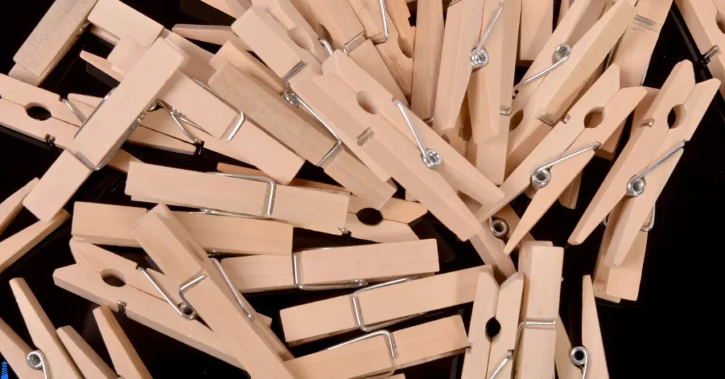 A bunch of wooden Clothes Pins